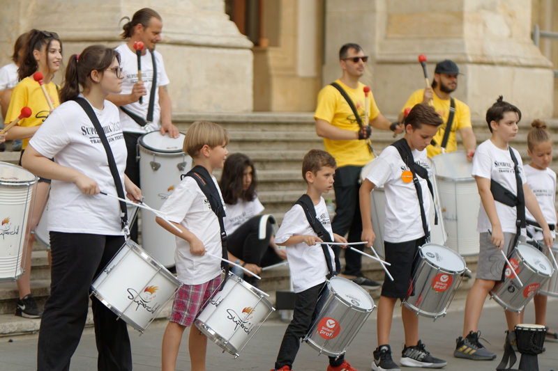 20 - Members of the youth percussion group Trupa Superchill from Superchill School performing outdoors with drums
